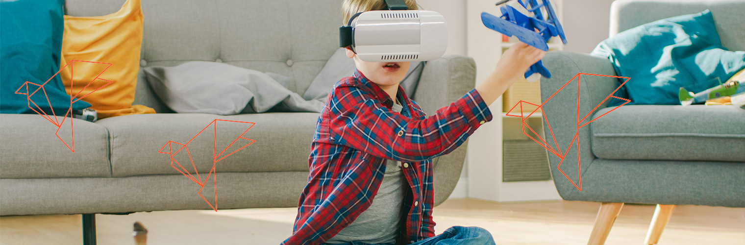 dziecko w okularach VR bawi się samolotem